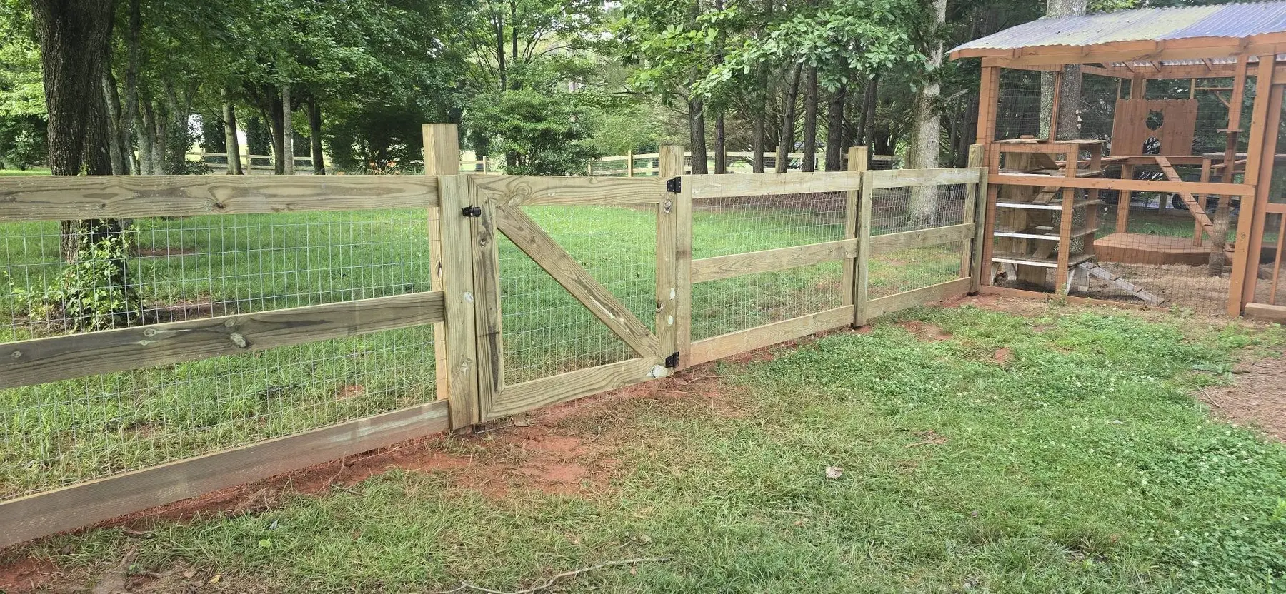 Long custom fence line built to follow a rural property